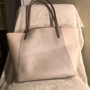 Selling a cream and taupe bag. Offers can be made.